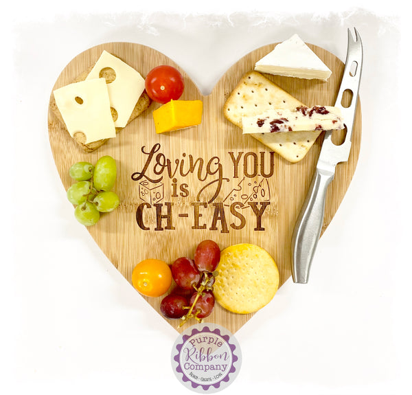 Bamboo Heart Cheese Boards with text “Loving you is CH-EASY”